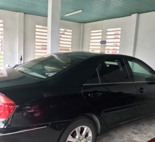 Xe ô tô Toyota Camry 2.4G, biển số: 92A-002.97, màu sơn: đen, số chỗ ngồi: 05 chỗ. Số khung: ACV30-8011960, số máy: 2AZ-3217559